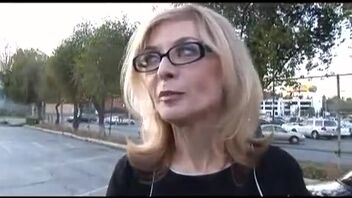 Mature Nina Hartley experiences rough interracial threesome sex