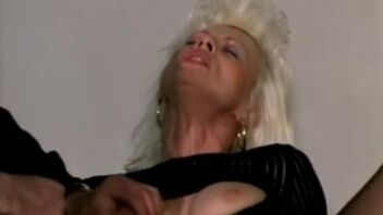 Retro blonde with stockings gets fisted brutally